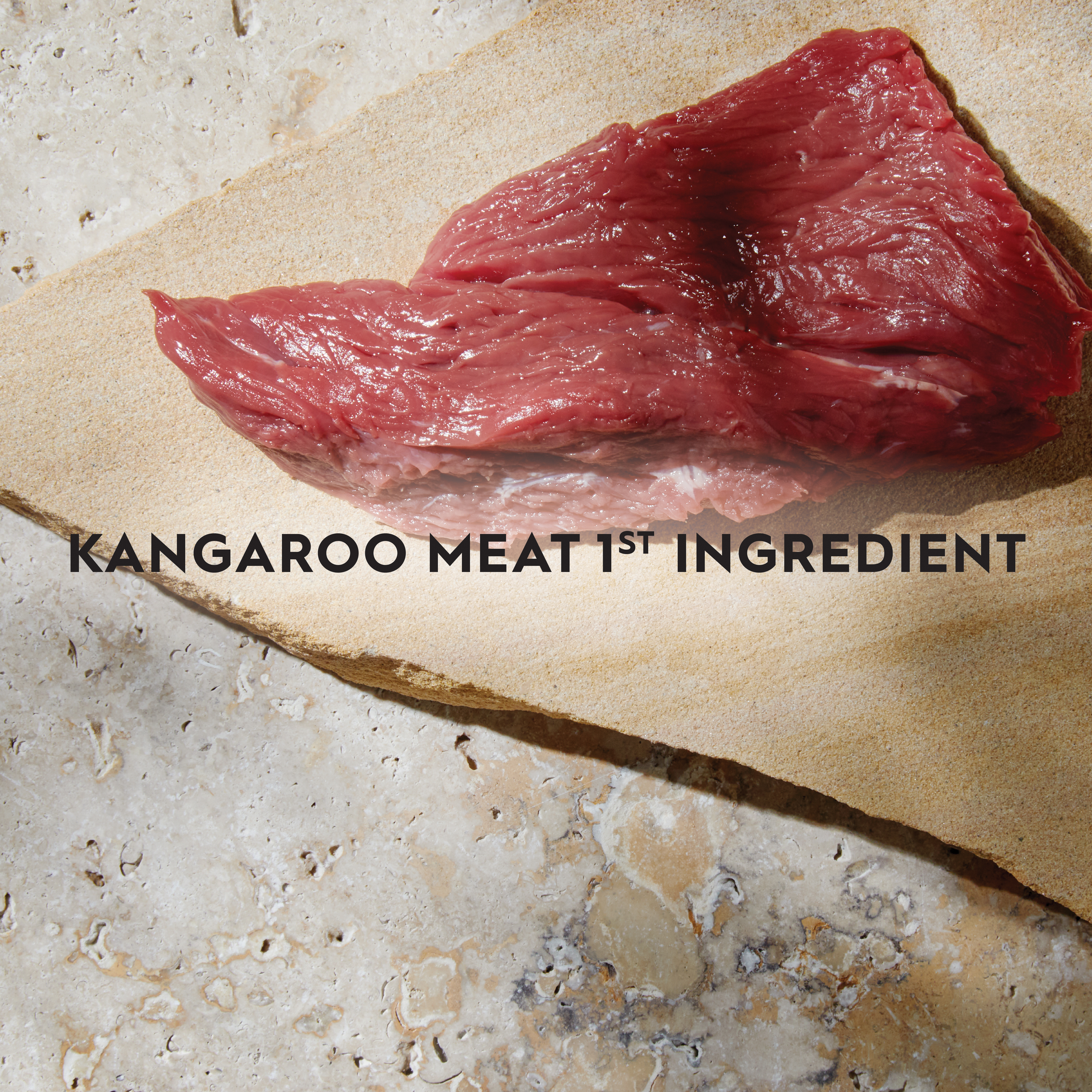 Raw kangaroo meat on hessian with the caption kangaroo meat first ingredient