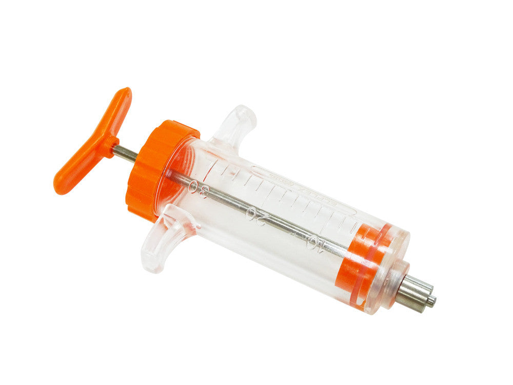 Genia Elplex reusable plastic hypodermic syringe