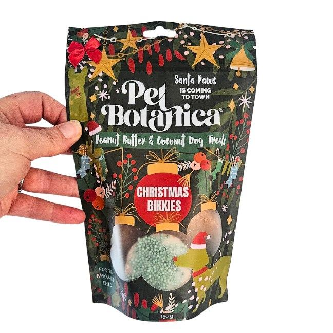 Yoghurt-glazed Christmas cookies for dogs tipped out of the Bikkies pouch