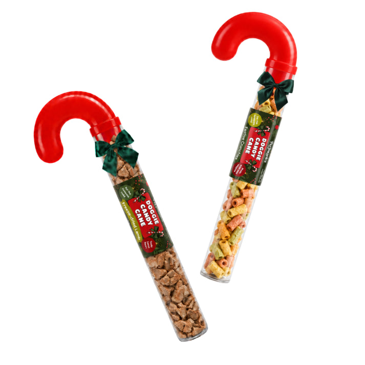 Candy cane tube opened showing the freeze-dried lamb and vegetable pieces inside