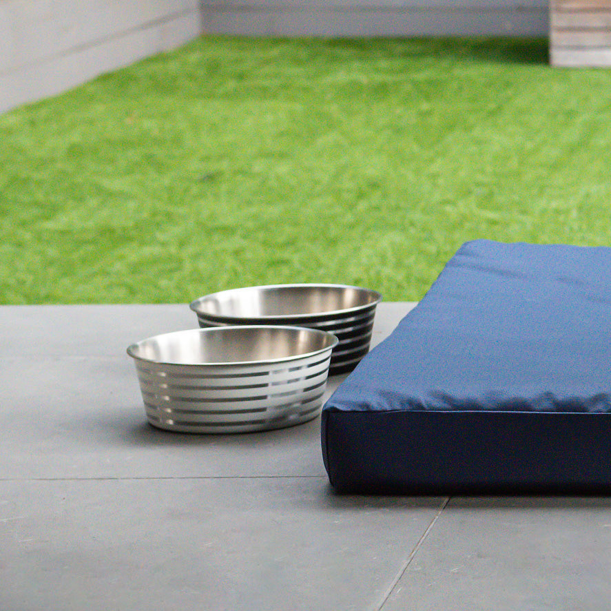 Superior Pet Goods Heavy Base Pet Bowls in matte black and beige side by side