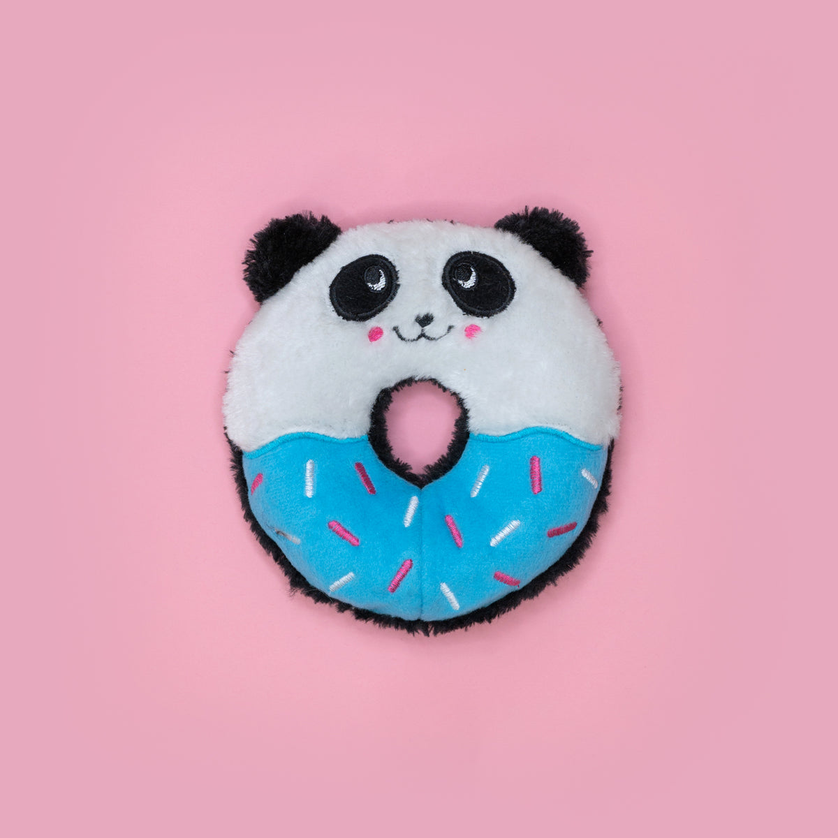 Dog holding the Zippy Paws Donutz Buddies Panda