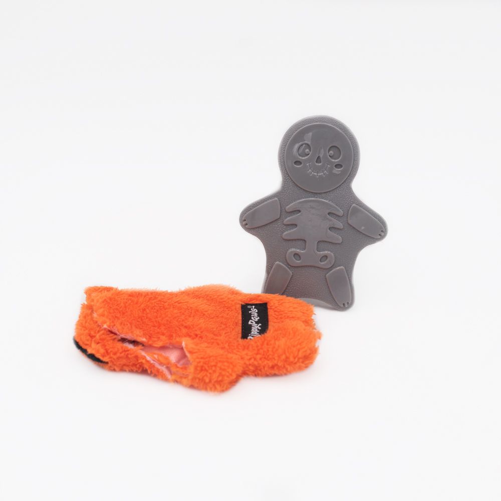 Halloween Bonez Zombie Cat laid flat beside its squeaky bone