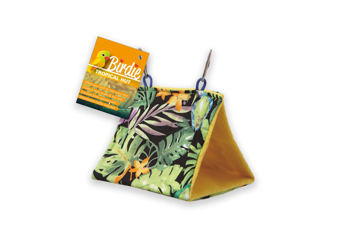 Birdie Tropical Bird Hut, a tent-shaped hanging hut in tropical leaf print with a yellow lining and hang tag