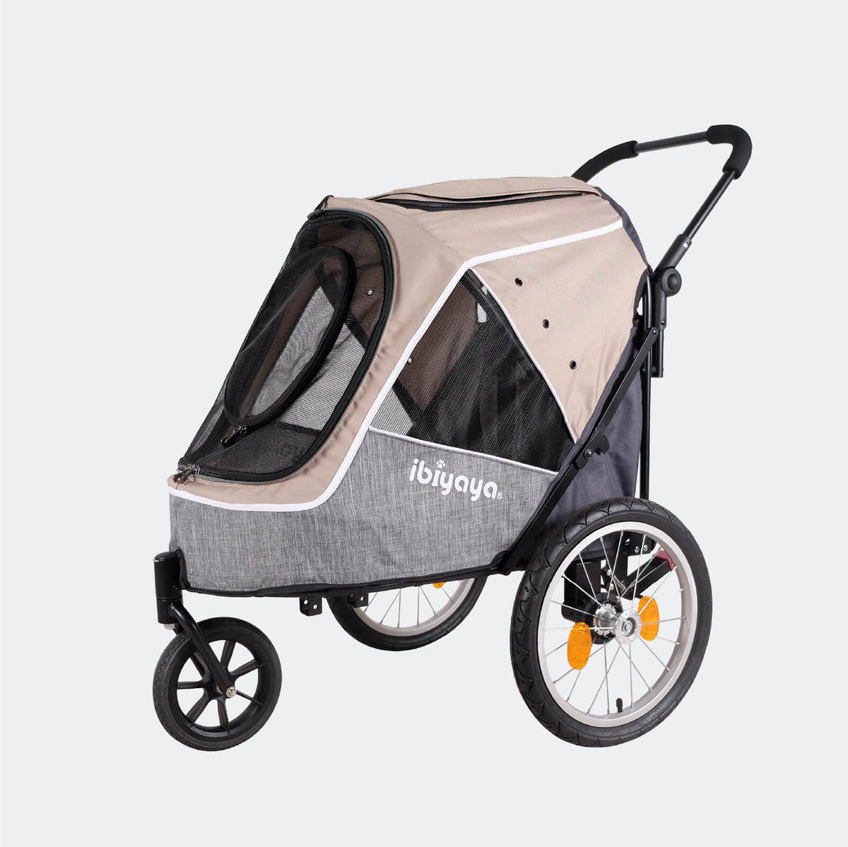 Ibiyaya Happy Pet Tri-cycle trailer jogger in latte, side view with its large spoked wheel
