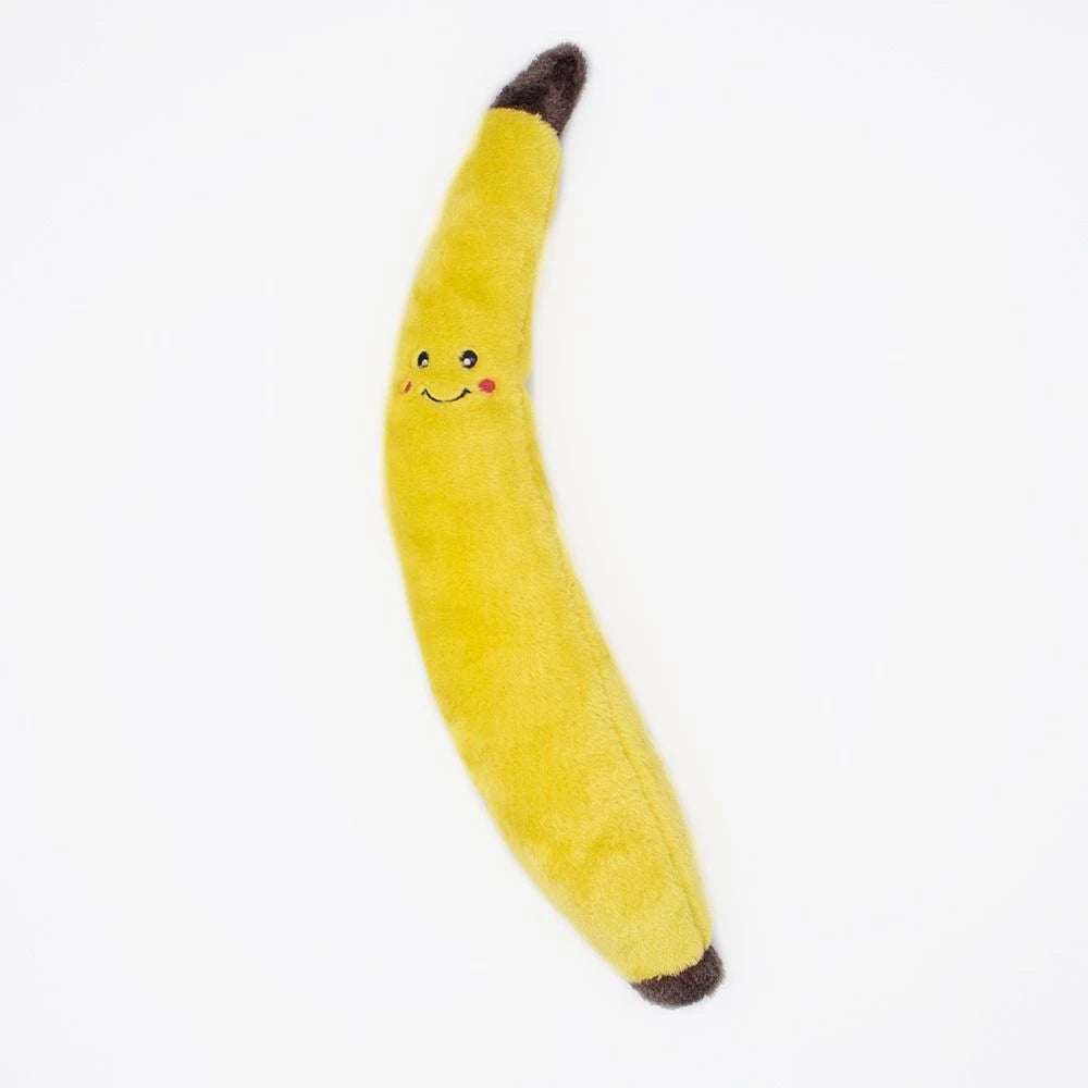 Zippy Paws Jigglerz plush banana dog toy with a smiling face, on a white background