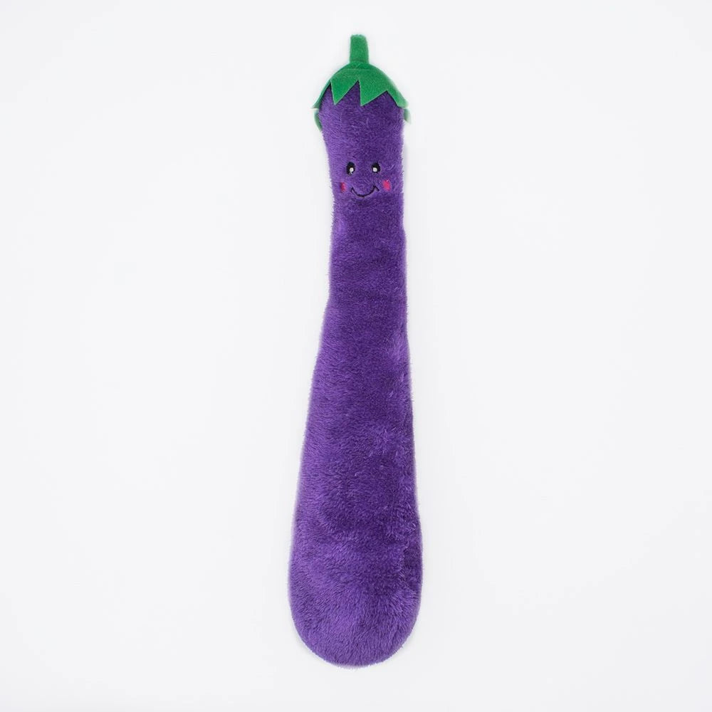 Zippy Paws Jigglerz plush eggplant dog toy with a smiling face and green stem, on white