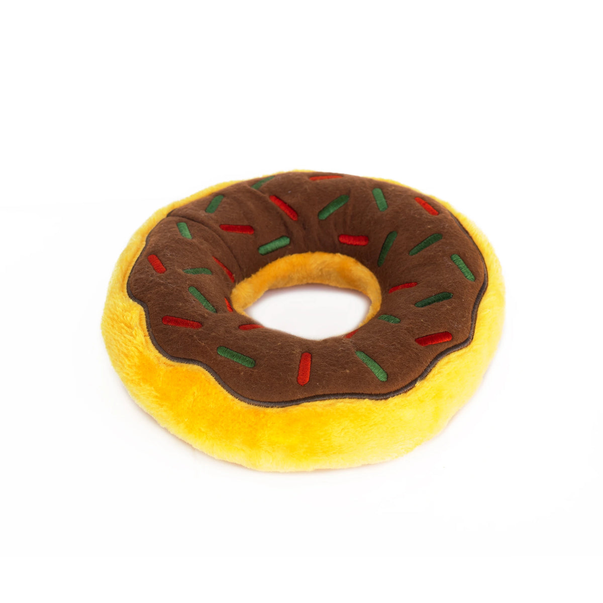 Zippy Paws Donutz Jumbo plush dog toy with gingerbread icing, angled view showing its depth