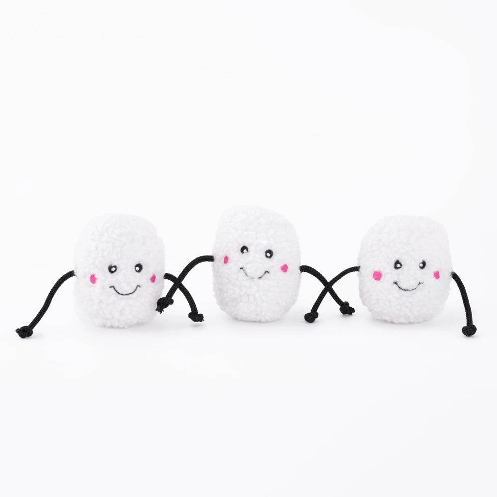 Three Zippy Paws Miniz plush marshmallow dog toys with smiling faces, on white