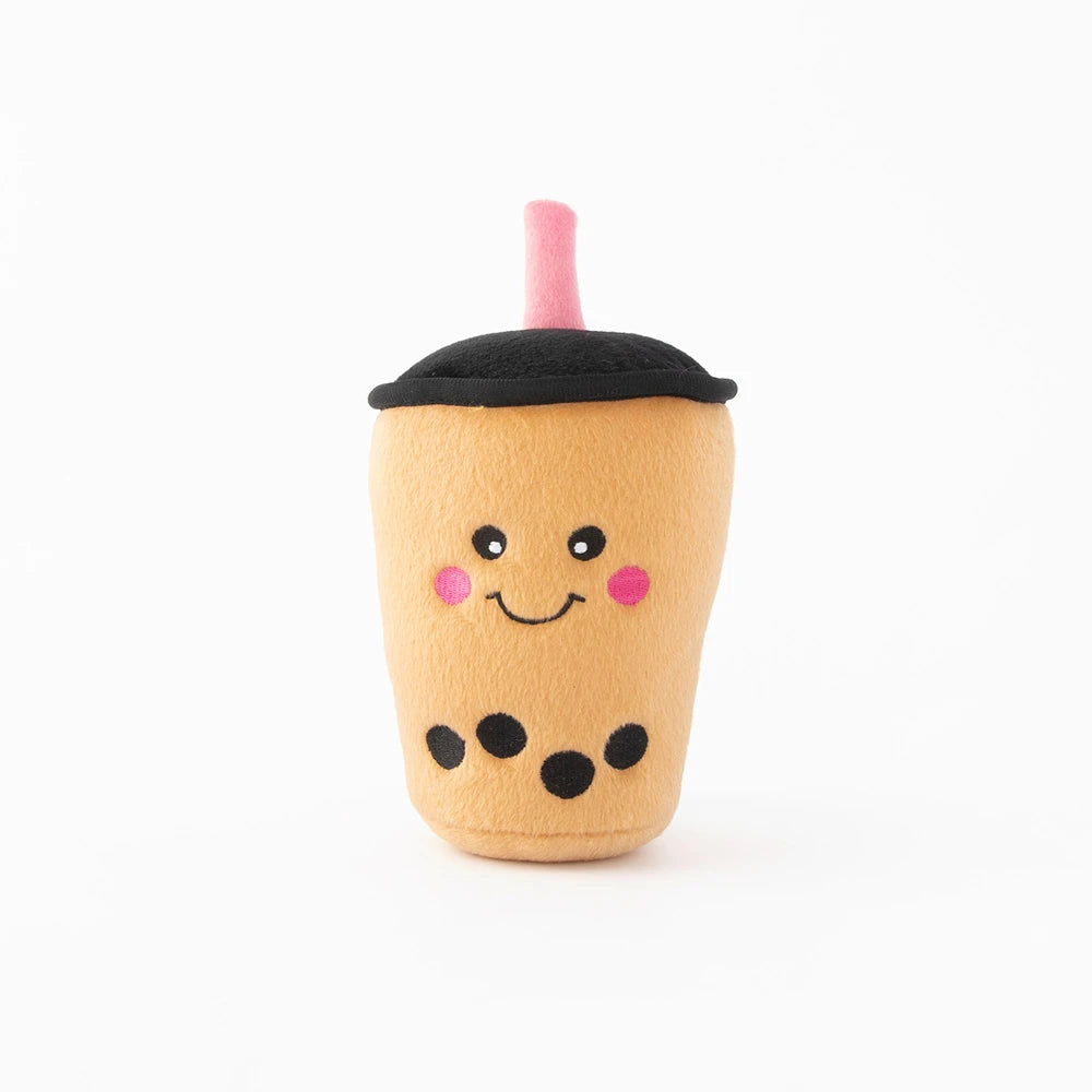 Zippy Paws NomNomz plush dog toy shaped as a boba milk tea cup with a pink straw