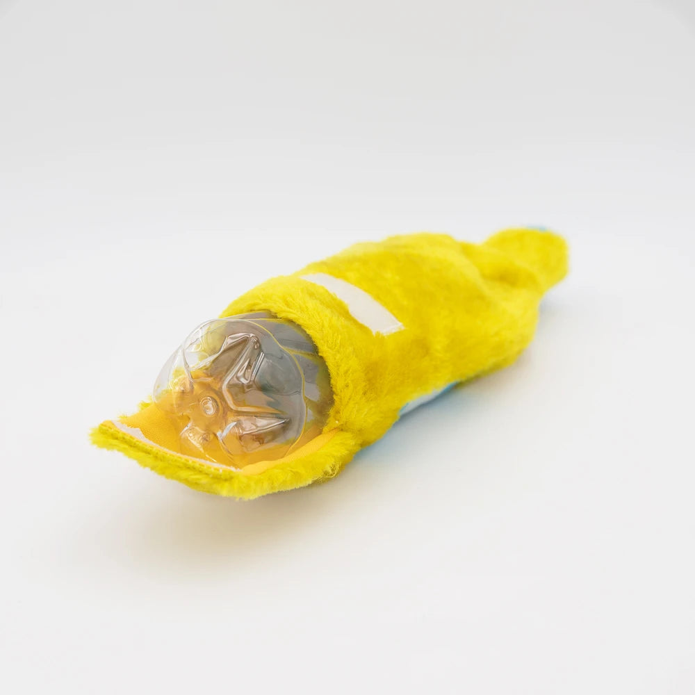 Yellow Zippy Paws Happy Hour Crusherz plush dog toy opened to show the crinkle bottle inside