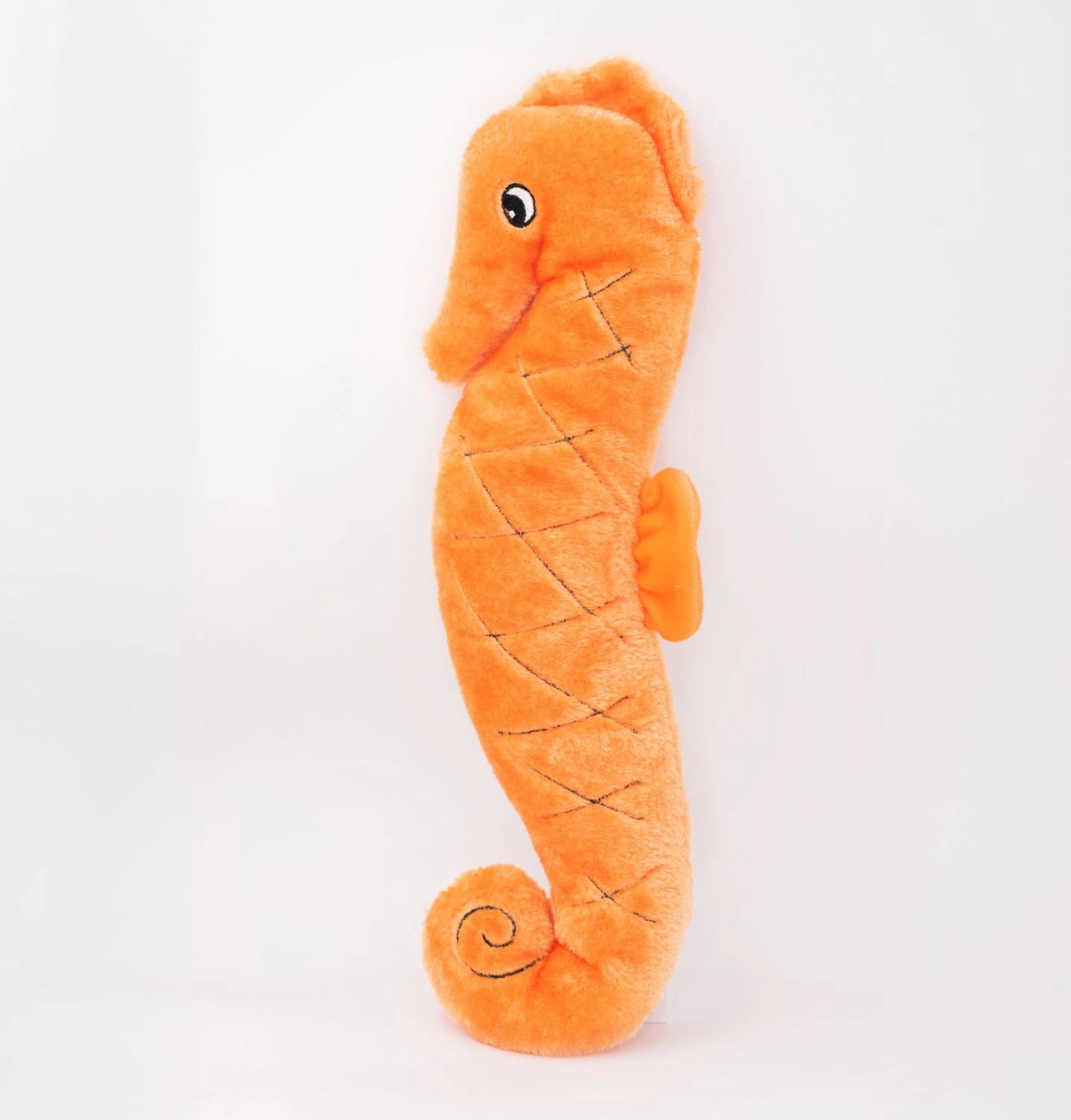 Zippy Paws Jigglerz plush orange seahorse dog toy seen from the other side, on white