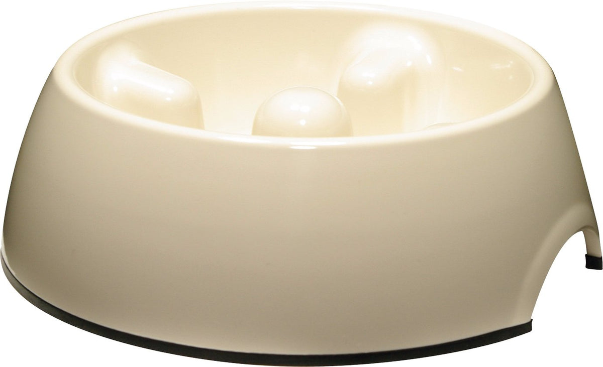 Cream anti-gulping slow feeder dog bowl with raised feeding humps, angled view
