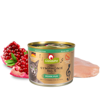 GranataPet Symphonie No. 5 Chicken PUR 200g tin, front of pack, beside a raw chicken breast and pomegranate seeds