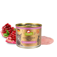 GranataPet Symphonie No. 2 Prawn & Turkey 200g tin, front of pack, beside a halved pomegranate and raw turkey