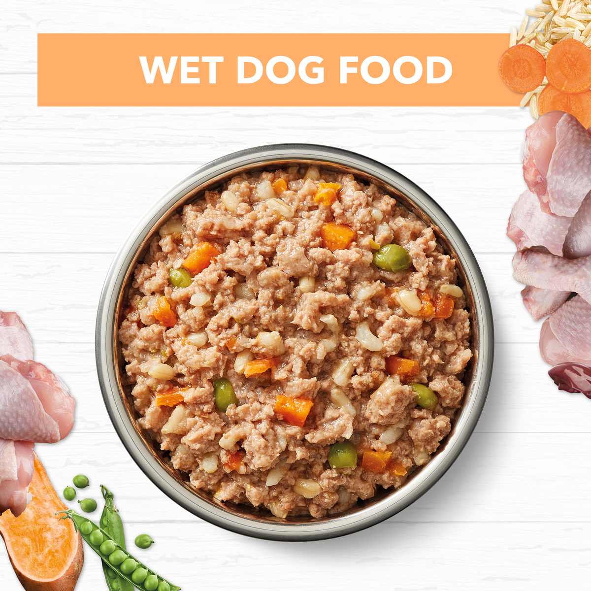 Ivory Coat Chicken and Brown Rice puppy food in a bowl with raw ingredients