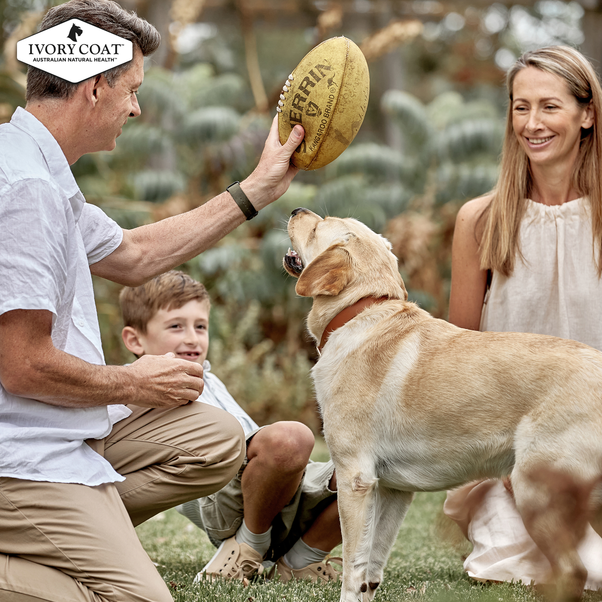 A family playing outdoors with a Labrador, Ivory Coat lifestyle photo
