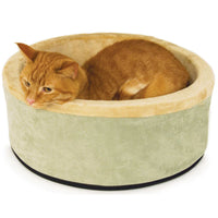 Ginger cat curled in the sage green K&H Thermo-Kitty heated cat bed