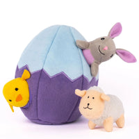 Zippy Paws Interactive Burrow dog toy: an Easter egg with a squeaky bunny, chick and lamb
