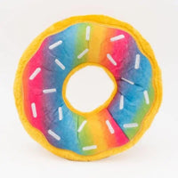 Zippy Paws Donutz plush dog toy with rainbow icing and white sprinkles, on a white background