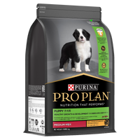 PRO PLAN Puppy Medium Breed Chicken dry dog food bag, front of pack, with a border collie puppy