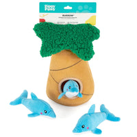 Zippy Paws Interactive Burrow palm tree dog toy with plush dolphins, on its retail card