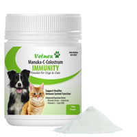 Vetnex Manuka-C-Colostrum Immunity Powder tub with a pile of the white powder beside it