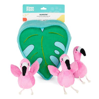 Zippy Paws Interactive Burrow monstera leaf dog toy with plush flamingos, on its card