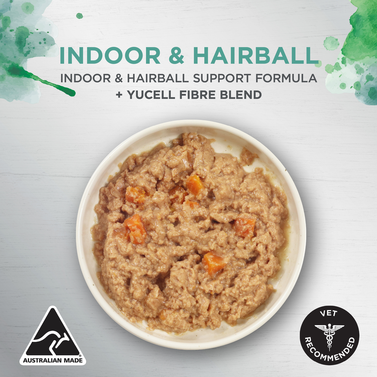 Ivory Coat Indoor and Hairball wet cat food in a bowl, with Yucell fibre blend