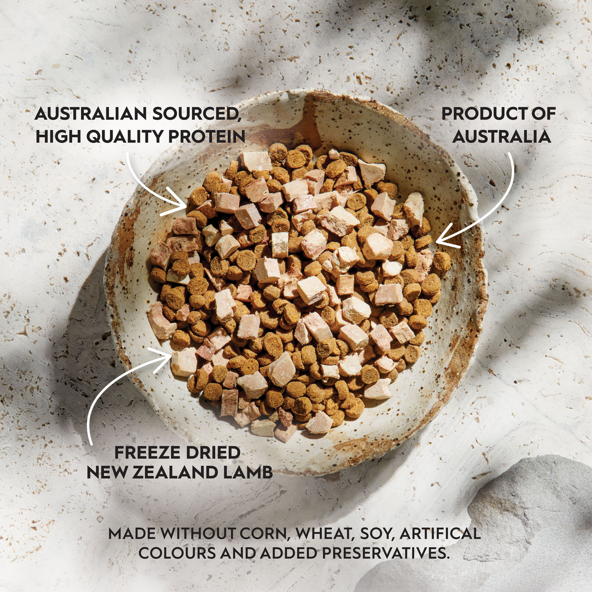 Bowl of Trilogy Kitten kibble with freeze dried lamb, labelled Australian sourced protein