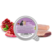 Foil lid of the GranataPet Filet A La Carte Ente & Huhn 85g tray, with raw duck and chicken alongside