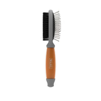 Wahl double sided dog brush seen edge-on, bristle face on one side and steel pins on the other