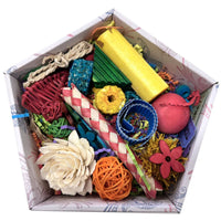 Beak Joy Happy Wings Toy Box, an open box of brightly coloured natural chew pieces