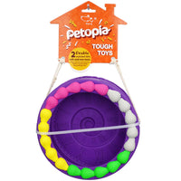 Petopia Ultra Tough Dog Toy Birthday Cake, a birthday cake shaped treat-dispensing chew toy in 100% natural rubber
