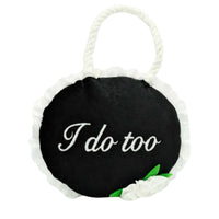 Zippy Paws plush dog toy: a round black wedding sign reading I do too, with a rope handle