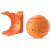 Orange Doggi Ball N Clip dog toy shown as two parts, the ridged ball and its clip