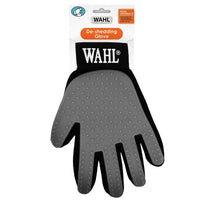 Wahl de-shedding dog grooming glove in grey and black on its Wahl retail header card