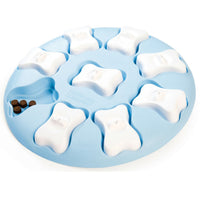 Nina Ottosson Puppy Smart Level 1 puzzle, pale blue disc with white bone-shaped treat covers