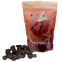 LifeWise Reward Nibbles pouch with a pile of dried kangaroo medallions beside it