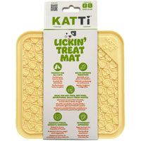 Katti Lickin' Treat Mat in its card packaging, yellow silicone mat