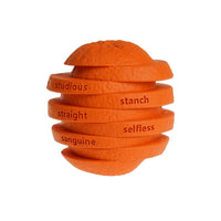 Petopia Ultra Tough Dog Toy Zesty Orange, an orange shaped treat-dispensing chew toy in 100% natural rubber