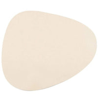 Lilly and Dash Asymmetric Placemat in Sand, a pebble-shaped cream silicone feeding mat