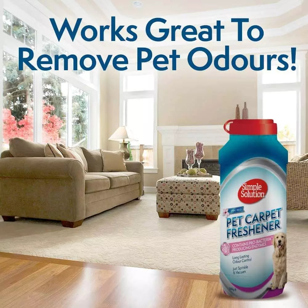 Carpet freshener granules being sprinkled over a dry carpet