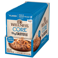Row of twelve Wellness CORE Tiny Tasters Flaked Tuna & Shrimp in Broth cat food pouches