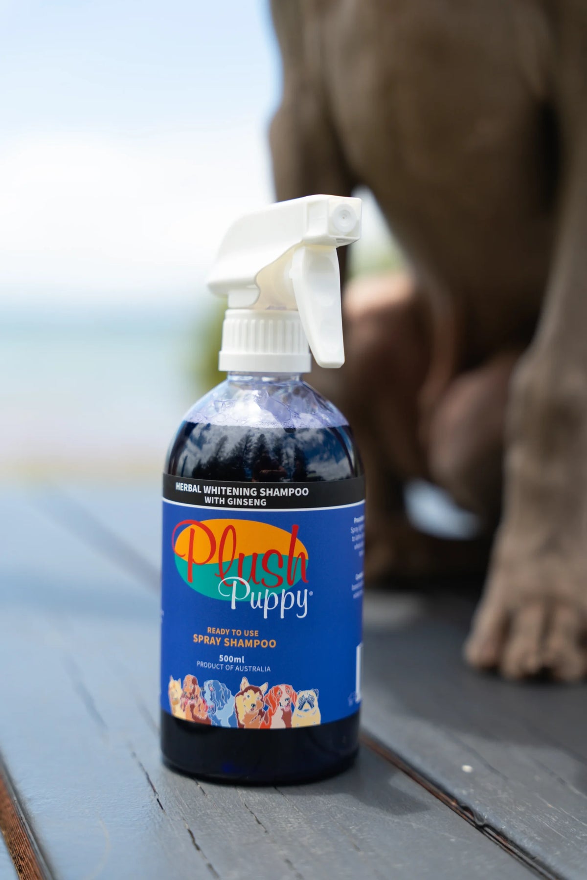 Plush Puppy Herbal Whitening Ready To Use Spray – bottle beside a dog, lifestyle photo