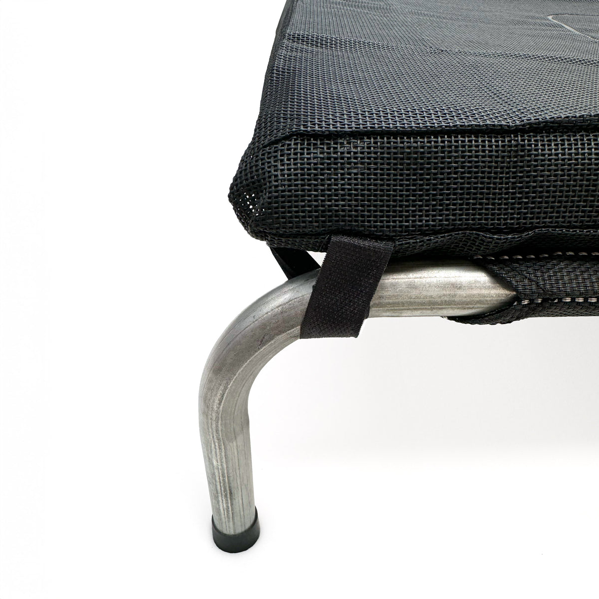 Superior Pet Goods Heavy Duty Flea-Free Dog Mat strapped to a raised dog bed