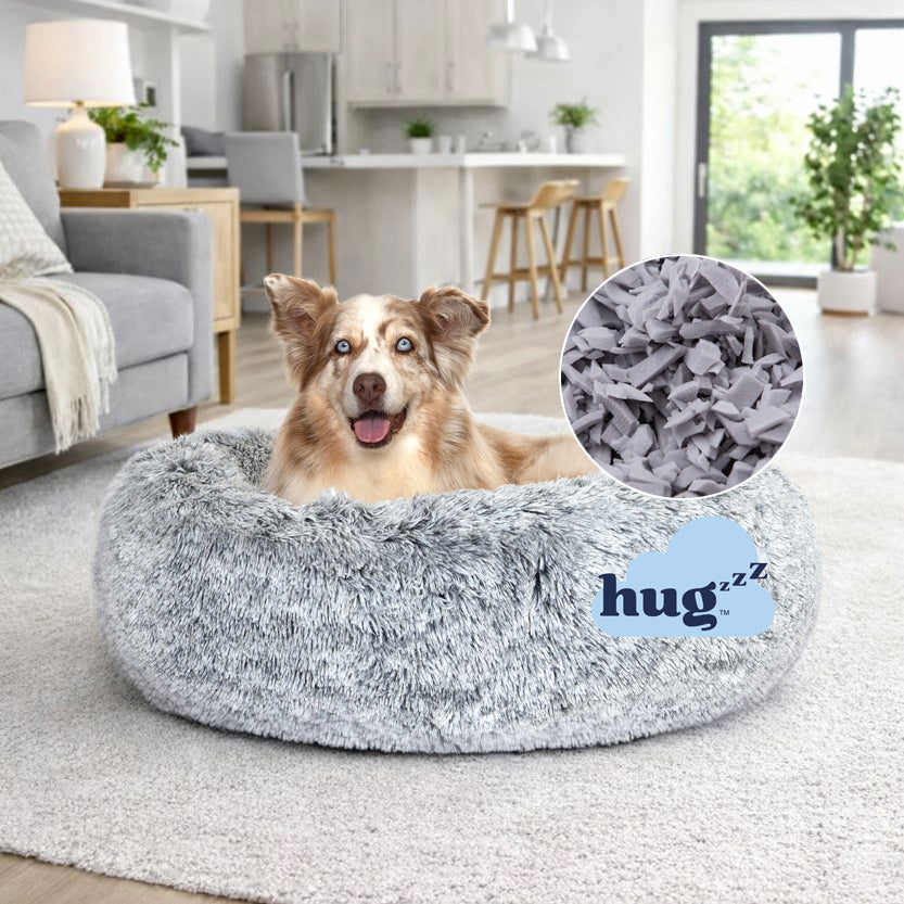 Hugzzz memory foam flake filling inside the Superior Pet Goods Curl Up Cloud Calming Dog Bed