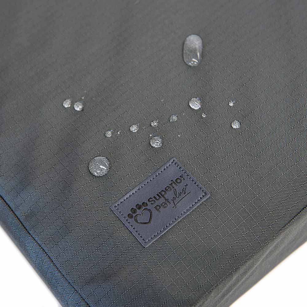 Water beading on the ripstop cover of the Superior Pet Goods Ortho Dog Mat