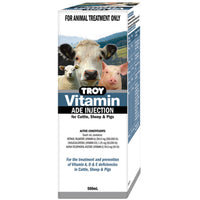 TROY Vitamin ADE Injection carton for cattle, sheep and pigs, 500 mL, with a cow and piglets pictured.