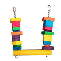 Cheeky Bird Block Swing, a timber perch with columns of coloured blocks and clips at the top